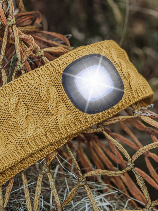 EquiLight merino wool LED headband with rechargeable hands-free LED light, designed to provide warmth, comfort and improved visibility for outdoor use in low-light conditions
