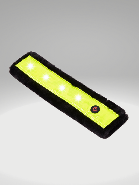 EquiLight faux fur LED sleeves designed for horse tack including bridles, reins, breastplates and martingales, with integrated rechargeable LED lighting to improve horse and rider visibility in low-light conditions
