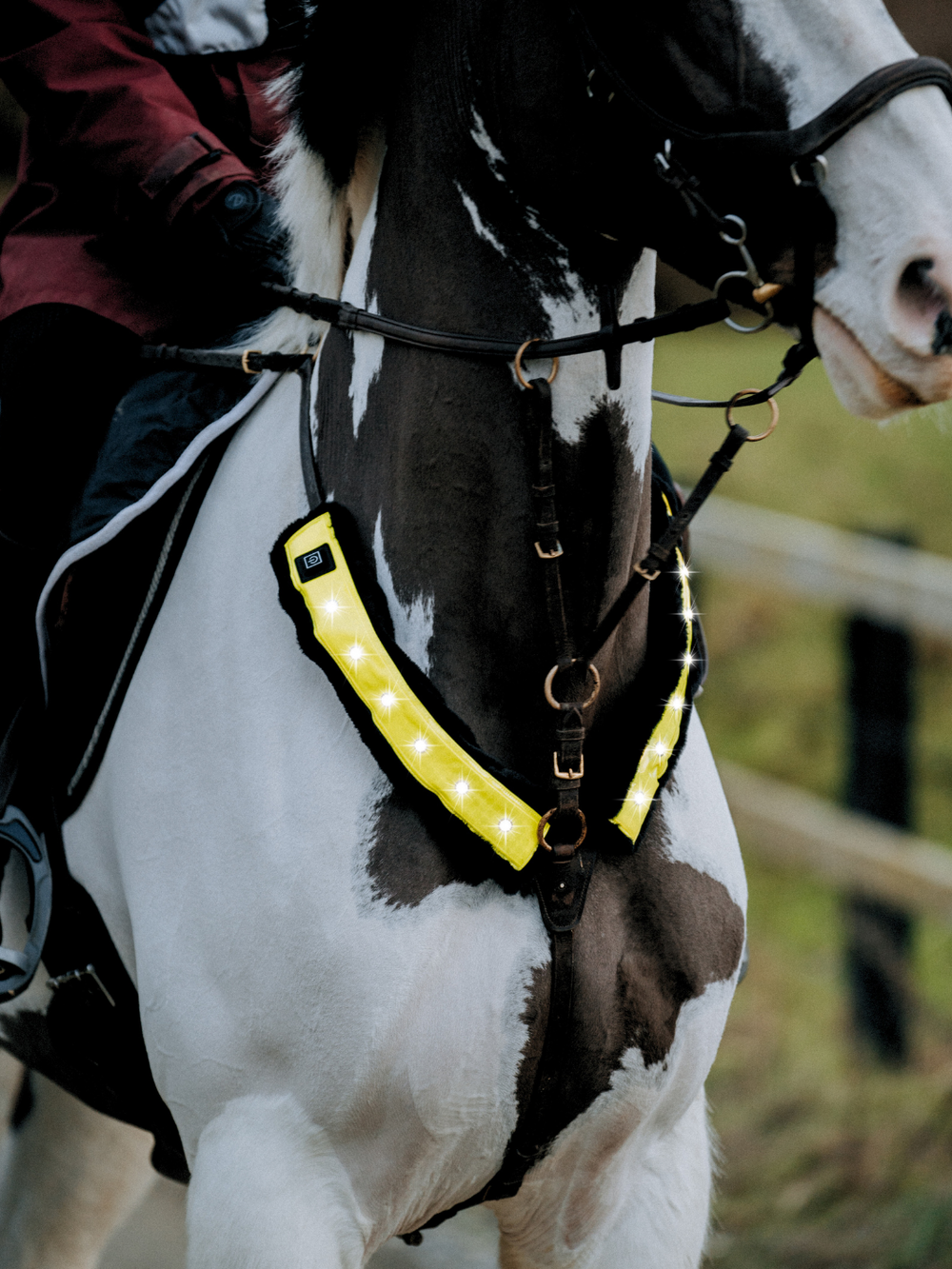EquiLight faux fur LED sleeves designed for horse tack including bridles, reins, breastplates and martingales, with integrated rechargeable LED lighting to improve horse and rider visibility in low-light conditions

