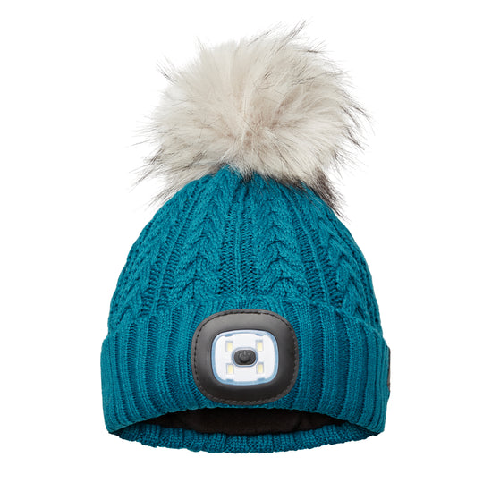 EquiLight Merino LED Pom Beanie with rechargeable hands-free LED light for outdoor visibility, Merino wool pom beanie with integrated rechargeable LED light by EquiLight, Person wearing EquiLight merino LED pom beanie for hands-free lighting outdoors, Close-up of integrated LED light on EquiLight merino pom beanie, Soft merino wool pom beanie with built-in LED light designed for warmth and comfort