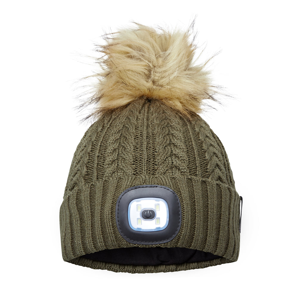 EquiLight Merino LED Pom Beanie with rechargeable hands-free LED light for outdoor visibility, Merino wool pom beanie with integrated rechargeable LED light by EquiLight, Person wearing EquiLight merino LED pom beanie for hands-free lighting outdoors, Close-up of integrated LED light on EquiLight merino pom beanie, Soft merino wool pom beanie with built-in LED light designed for warmth and comfort