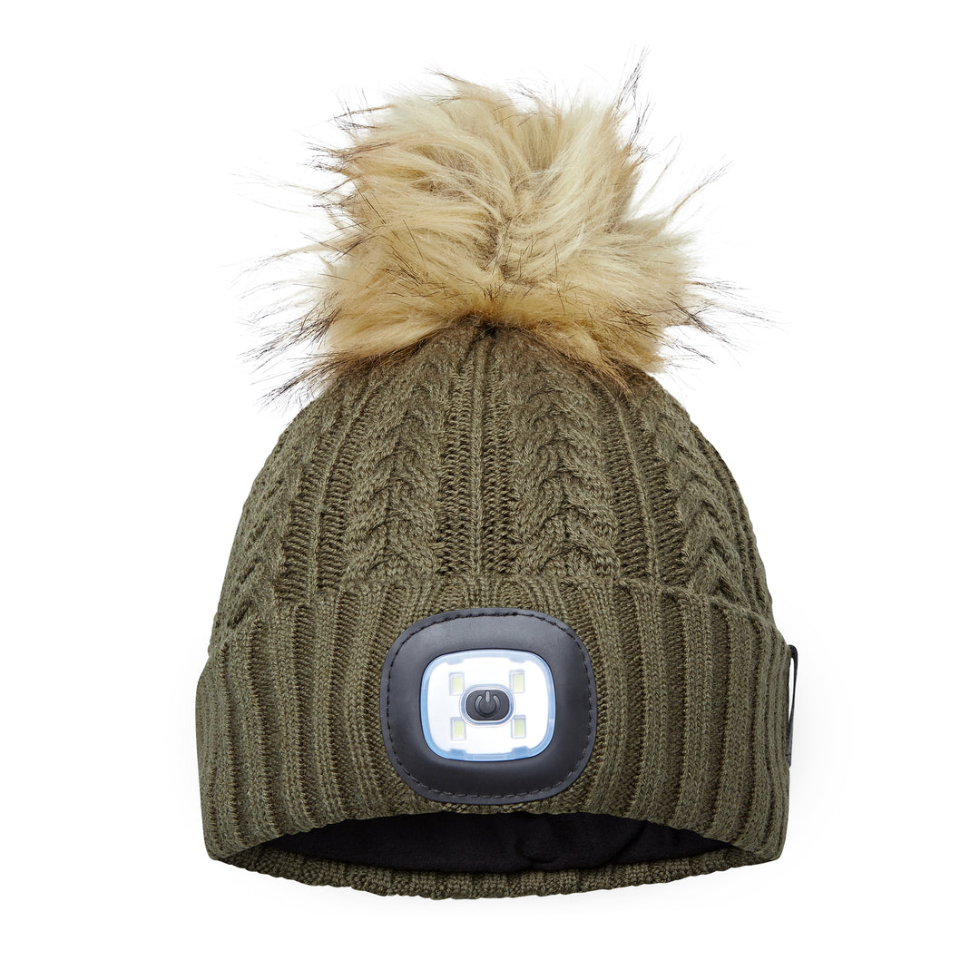EquiLight Merino LED Pom Beanie with rechargeable hands-free LED light for outdoor visibility, Merino wool pom beanie with integrated rechargeable LED light by EquiLight, Person wearing EquiLight merino LED pom beanie for hands-free lighting outdoors, Close-up of integrated LED light on EquiLight merino pom beanie, Soft merino wool pom beanie with built-in LED light designed for warmth and comfort