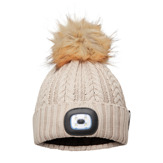 EquiLight Merino LED Pom Beanie with rechargeable hands-free LED light for outdoor visibility, Merino wool pom beanie with integrated rechargeable LED light by EquiLight, Person wearing EquiLight merino LED pom beanie for hands-free lighting outdoors, Close-up of integrated LED light on EquiLight merino pom beanie, Soft merino wool pom beanie with built-in LED light designed for warmth and comfort