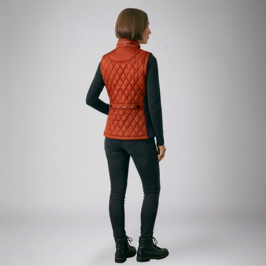 Woman wearing an Equilight Freestyle X LED gilet in red