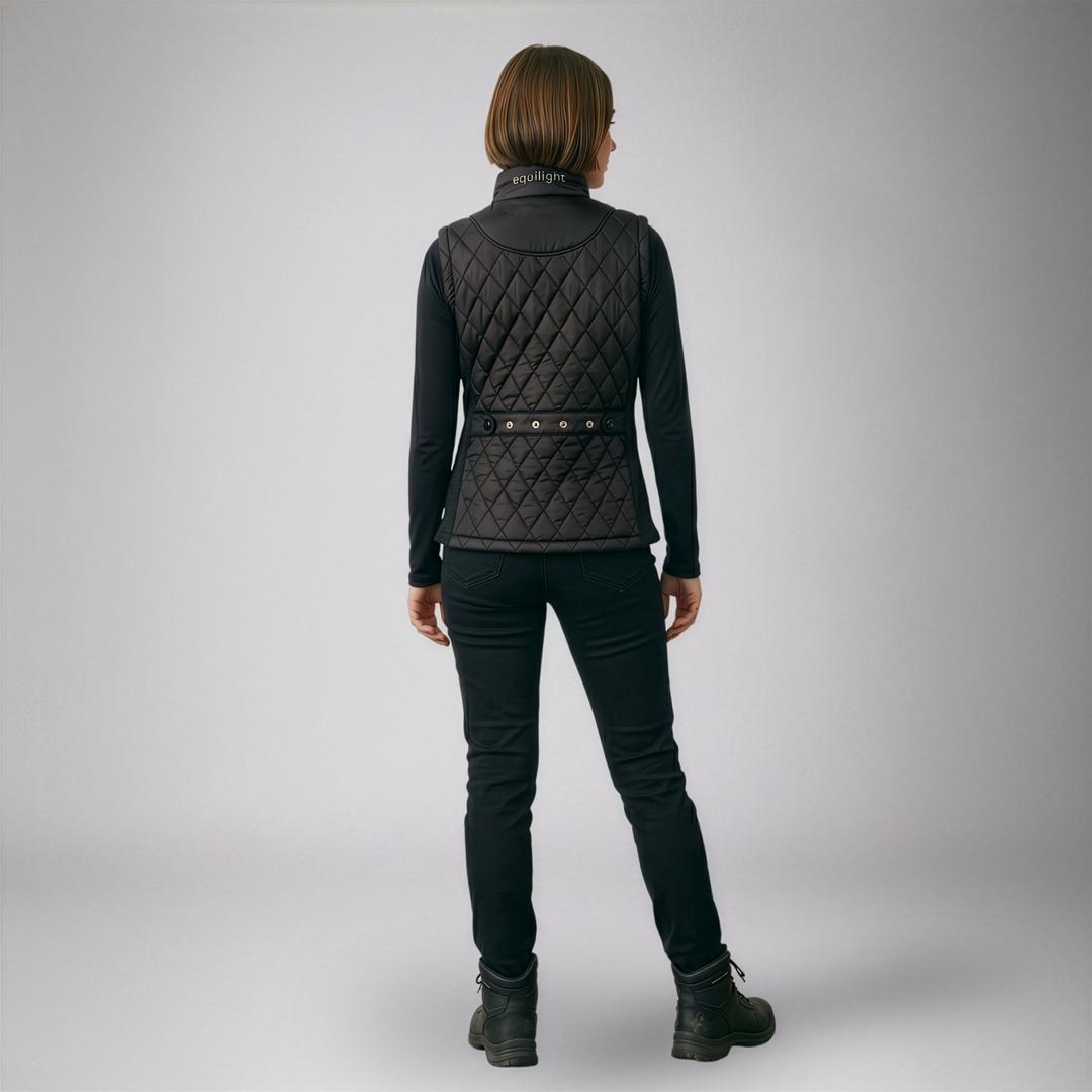 Woman wearing an Equilight Freestyle X LED gilet